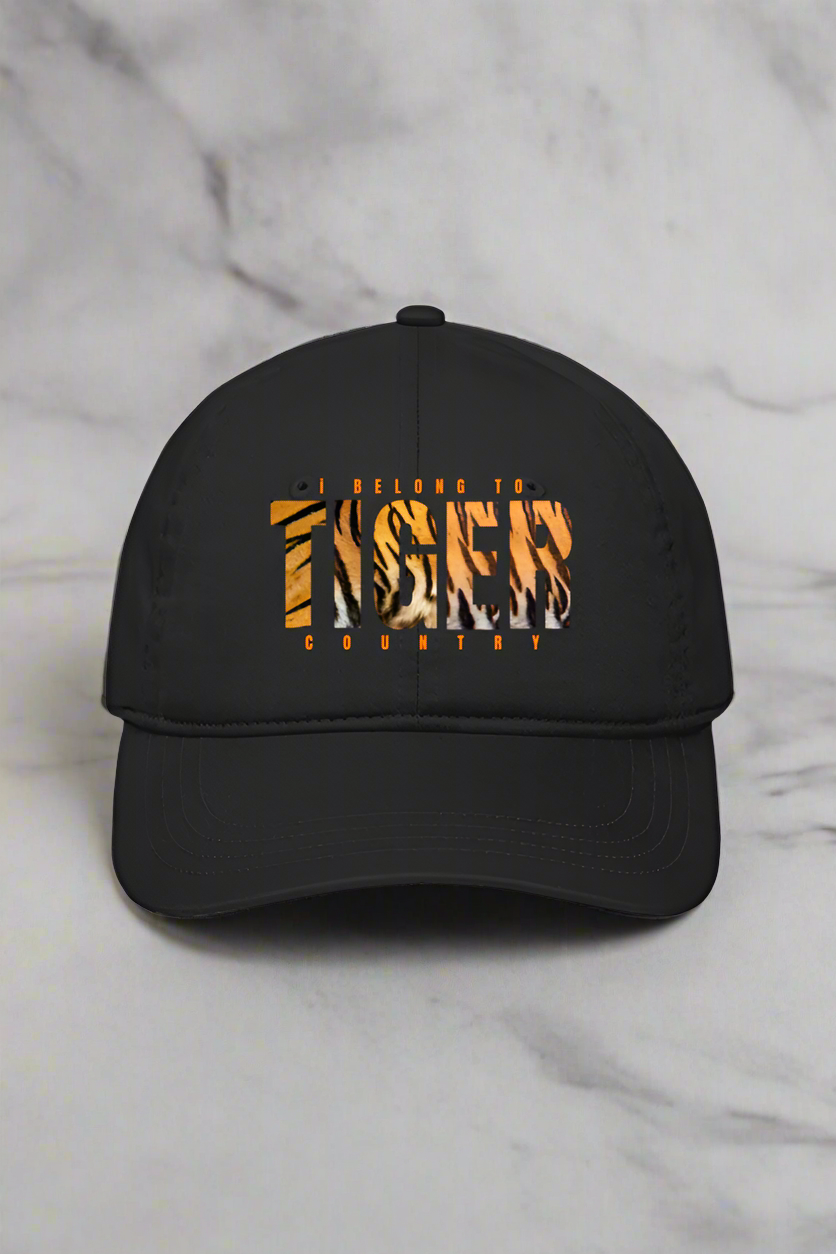 Printed on a marble surface, this I belong to Tiger Country black cap flaunts an orange tiger stripe pattern. Celebrate your nature affinity with TuckTribes Tiger Country Pride Cap. Product: Printed Tiger Country Baseball Cap.
