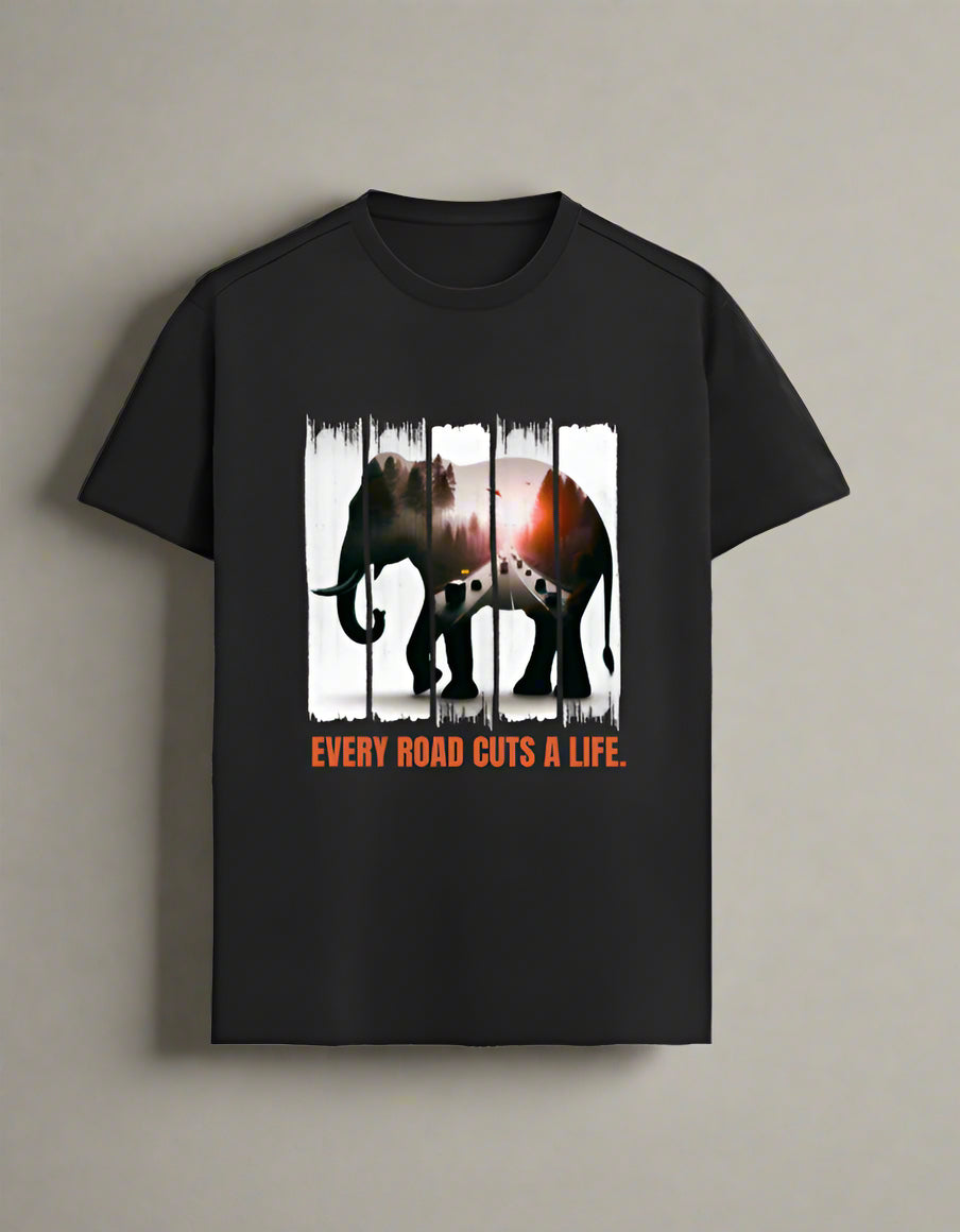 Elephant conservation T-shirt in black with fragmented silhouette artwork and the message "Every Road Cuts a Life" in bold orange.forest