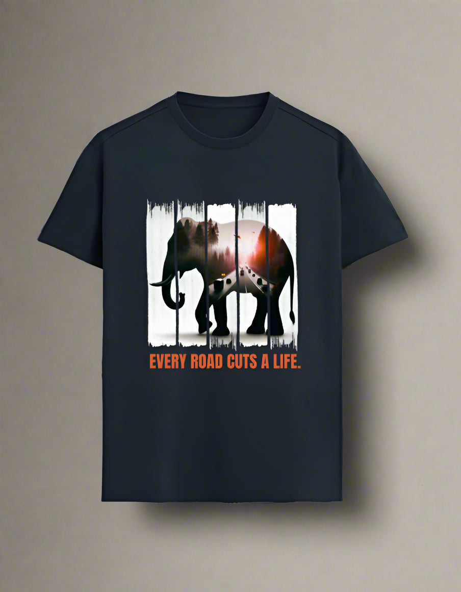 Elephant awareness T-shirt in navy blue featuring a double exposure forest-highway design inside an elephant shape with the slogan "Every Road Cuts a Life".