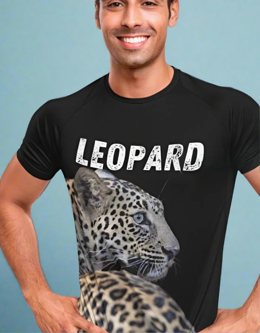 Man wearing a black t-shirt with a leopard graphic and 'LEOPARD' text on a light blue background
