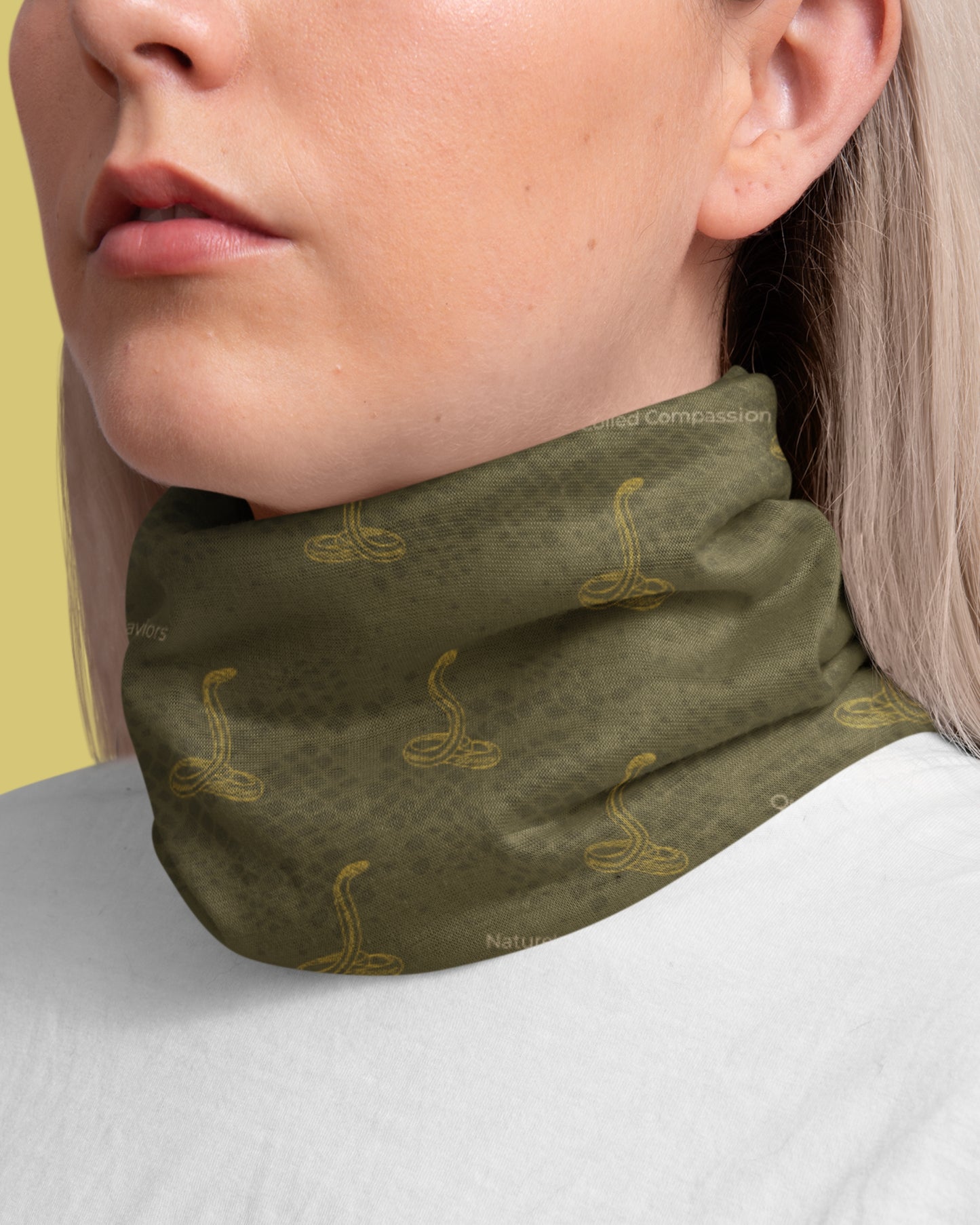 woman wearing a tucktribe Cobra snake wildlife neck gaiter