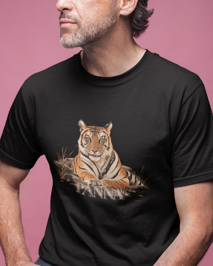 man wearing a Queen of Panna Bengal tiger graphic on black unisex T-shirt by Tucktribe with a pink background