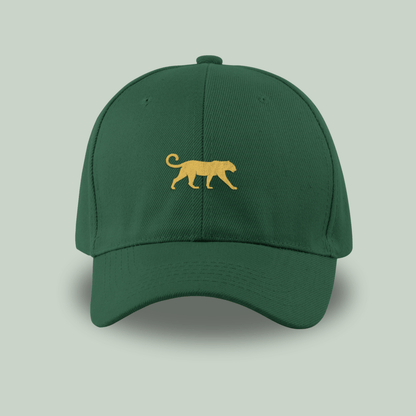 Tucktribe bottle Green cap with a gold panther logo on a light gray background