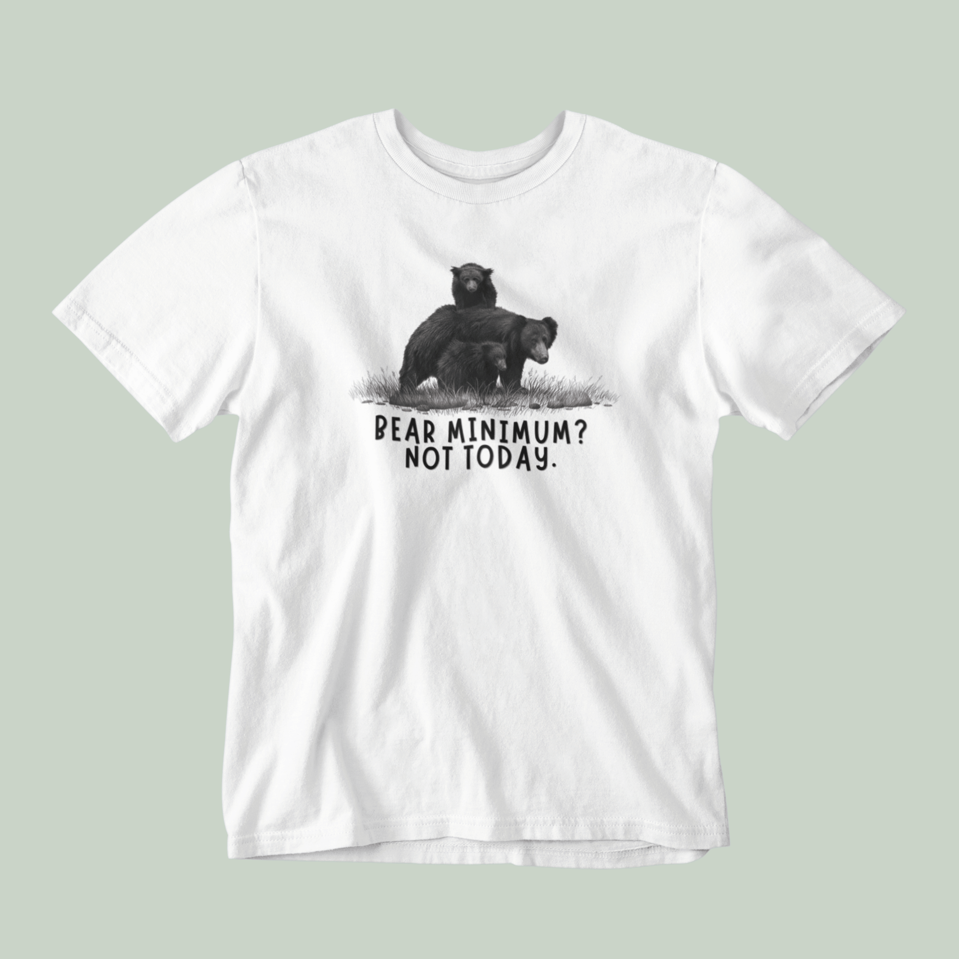 White t-shirt with bear graphic and text on a light green background