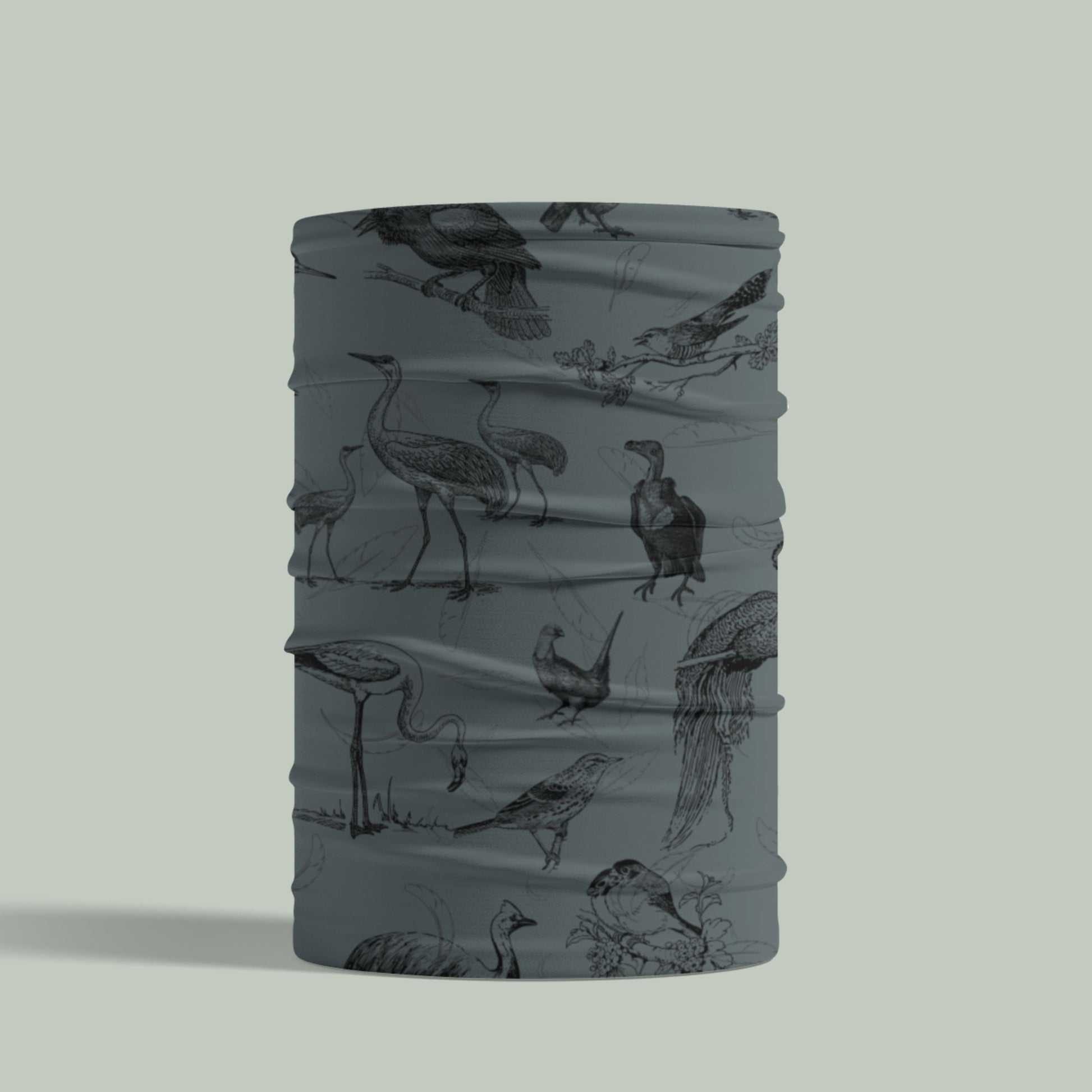 Neck gaiter with bird pattern on a light gray background