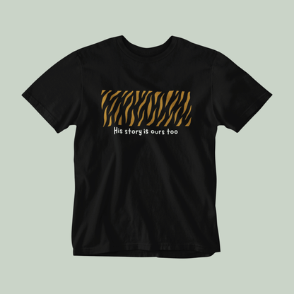 Black t-shirt with tiger stripe design and text on a light gray background