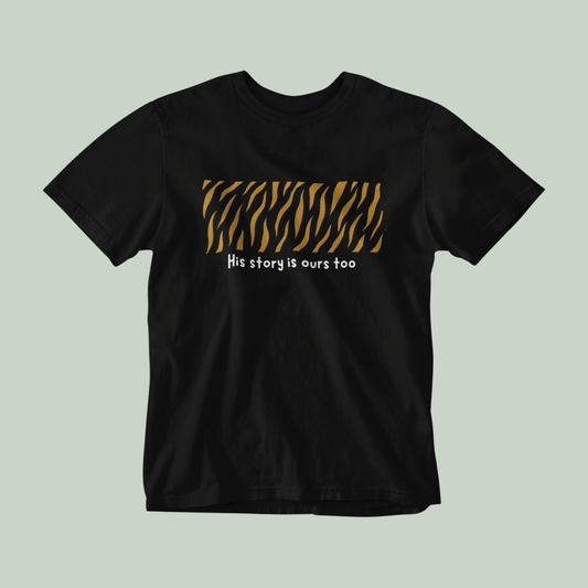 Black t-shirt with tiger stripe design and text on a light gray background