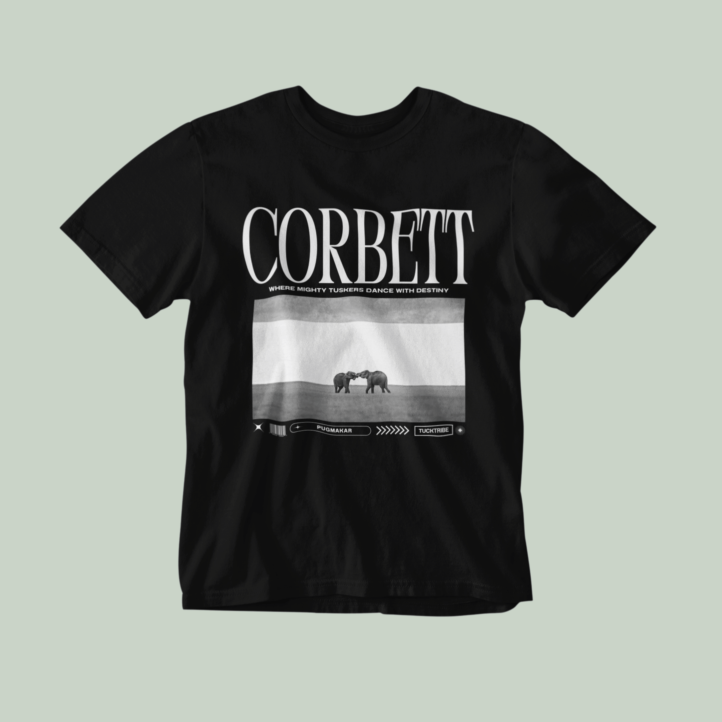 Black t-shirt with 'Corbett' design featuring two elephants on a light green background