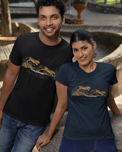 a boy and a girl wearing a black and navy blue Tucktribe Fables of Stripes unisex tiger graphic T-shirt