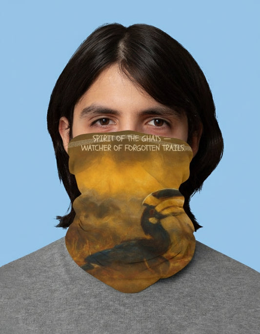 Person wearing a neck gaiter with a nature-themed design of malabar hornbill and text on a blue background