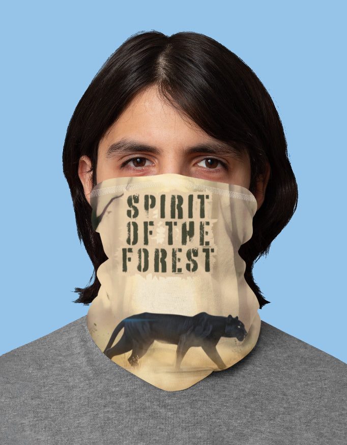Person wearing a face mask with 'Spirit of the Forest' design on a blue background