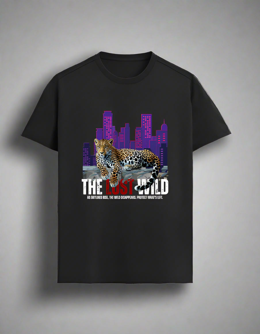 Black t-shirt with a leopard graphic and cityscape on a gray background