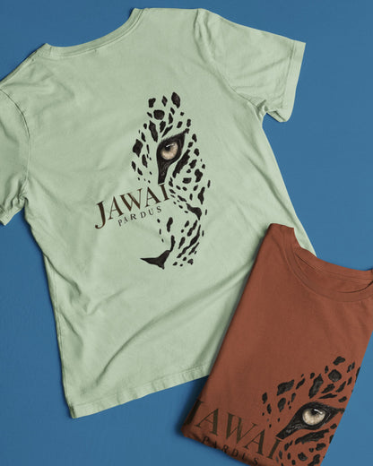 Two short-sleeve graphic T-shirts laid flat on a blue background. The larger shirt is light sage green and shows a black leopard face graphic with the text 'JAWAI PARDUS' on the front and another copper color tshirt folded with the same graphic