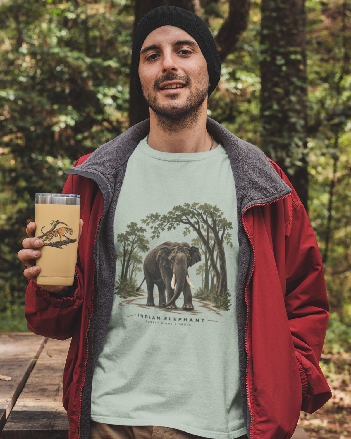 man wearing a jade green color Indian elephant tusker T-shirt inspired by Kabini wildlife