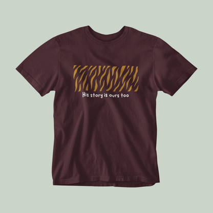 Maroon t-shirt with tiger stripe design and text on a light green background