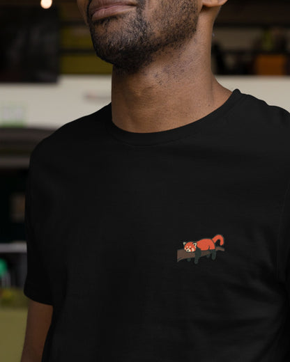 man wearing a Black premium cotton t shirt with red panda embroidery