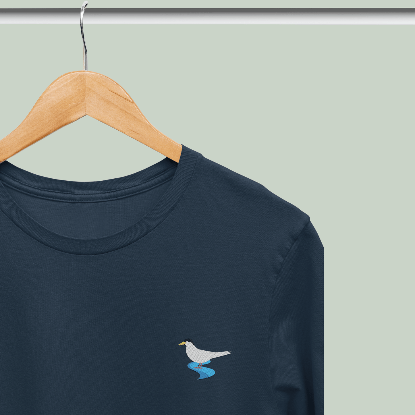 Navy blue Supima cotton t-shirt with embroidered River Tern bird design by Tucktribe