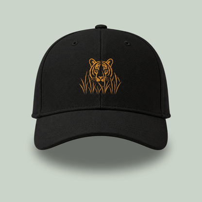 Front view of Black Ottoman cap with golden embroidered stalking tiger emerging through grass