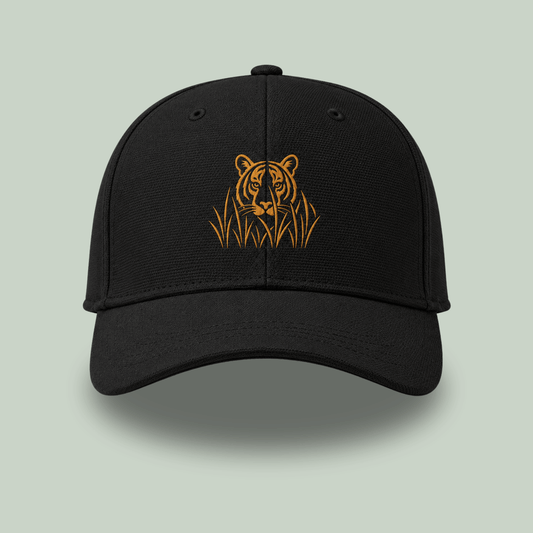 Front view of Black Ottoman cap with golden embroidered stalking tiger emerging through grass