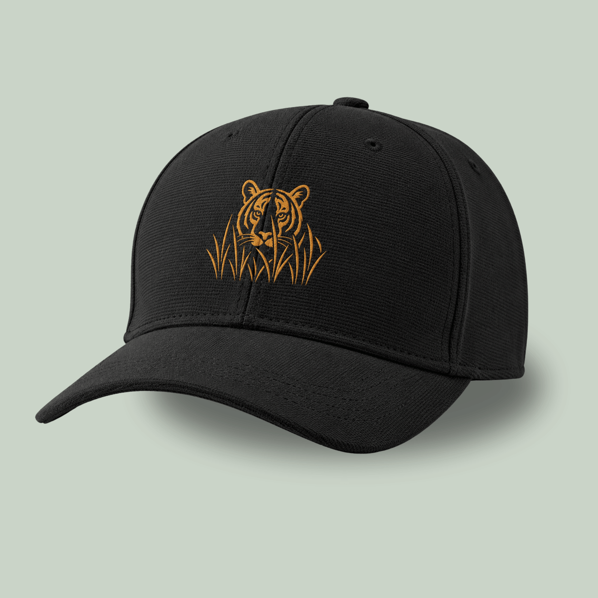Side view of Black Ottoman cap with golden embroidered stalking tiger emerging through grass