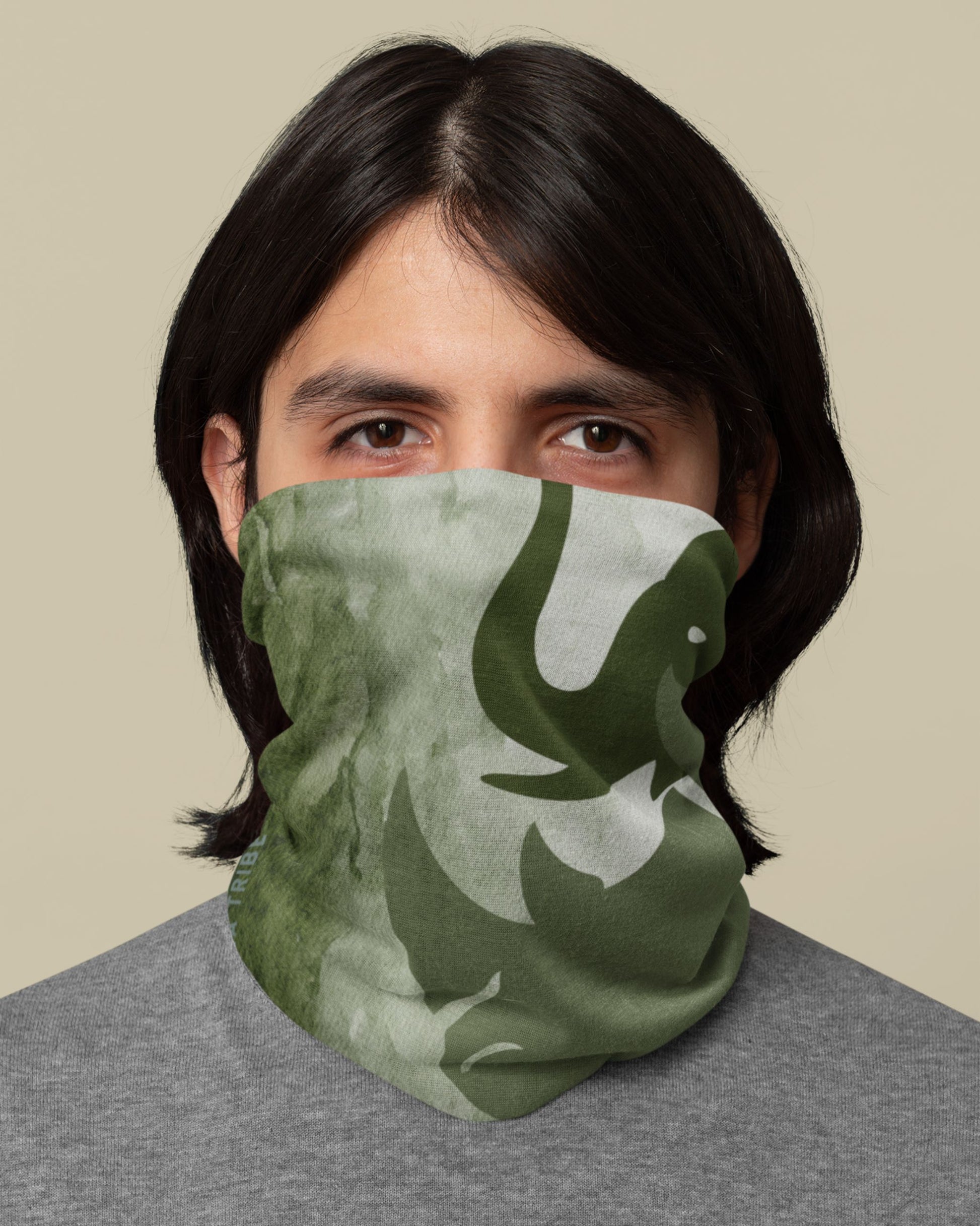 person wearing tucktribe giants of the wild elephant rhino neck gaiter
