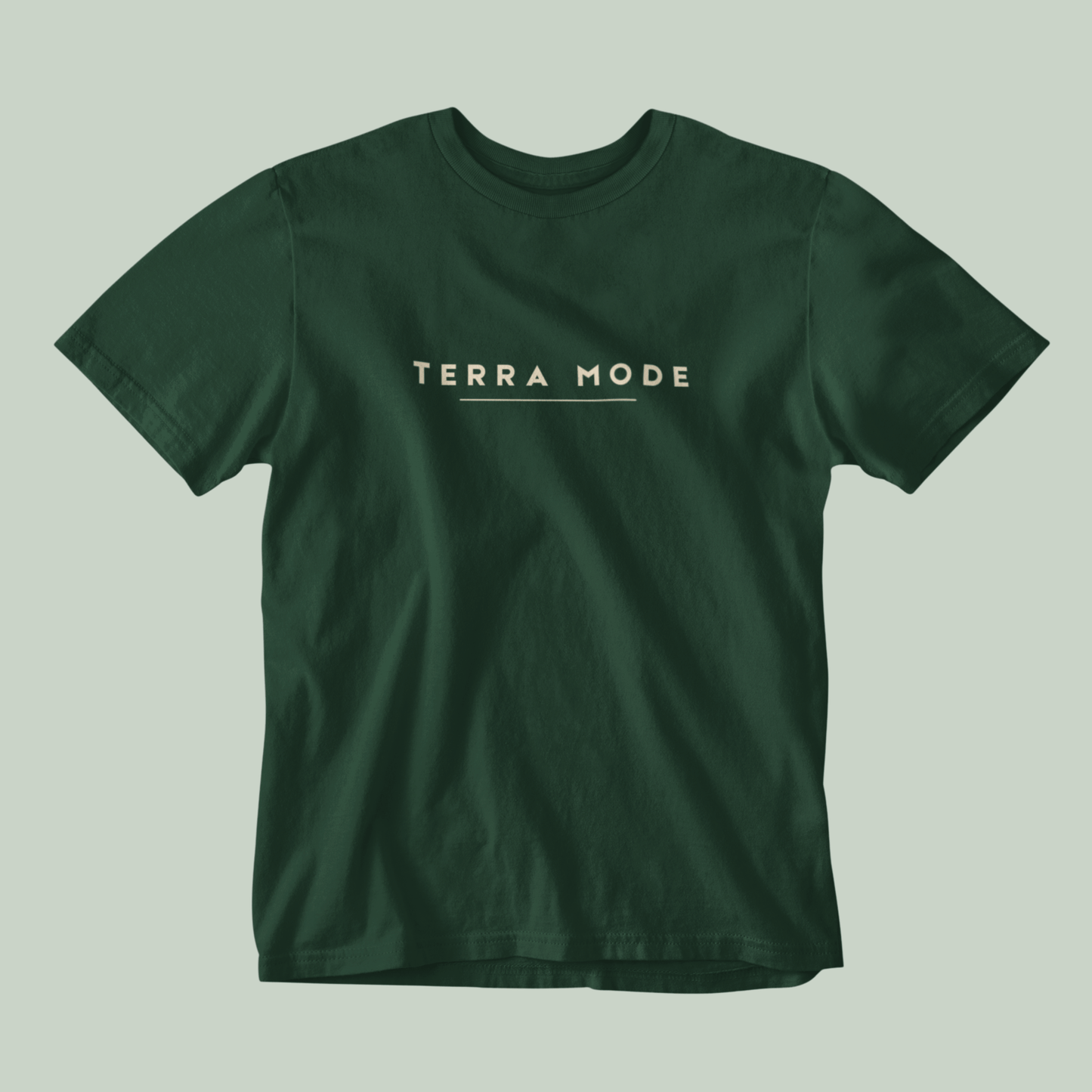 Tucktribe bottle Green t-shirt with 'Terra Mode' text on a light gray background