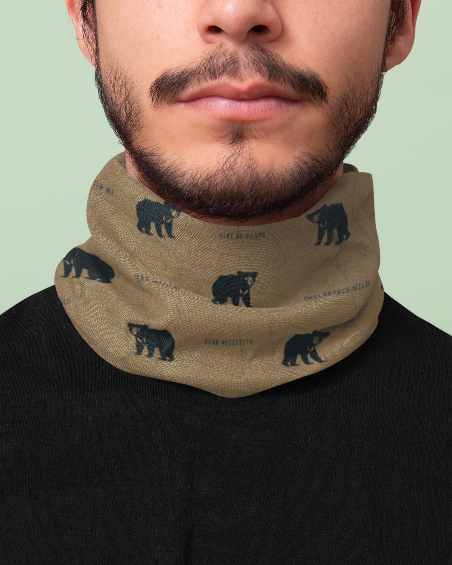 man wearing a bear wildlife outdoor buff tucktribe around his neck