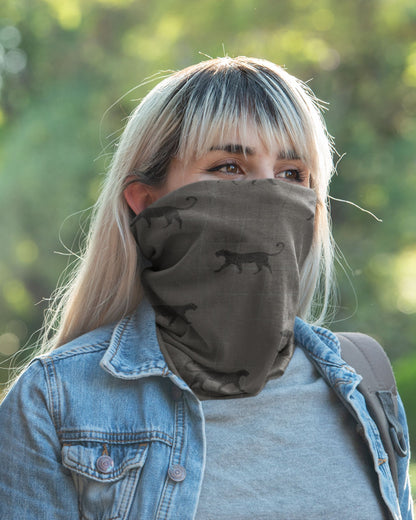 woman wearing a tucktribe silent stalker leopard neck gaiter