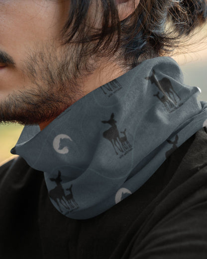 model wearing a deer wildlife outdoor buff by tucktribe around his neck