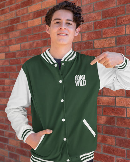a model wearing a green colour varsity jacket with ROAR WILD text on left pocket