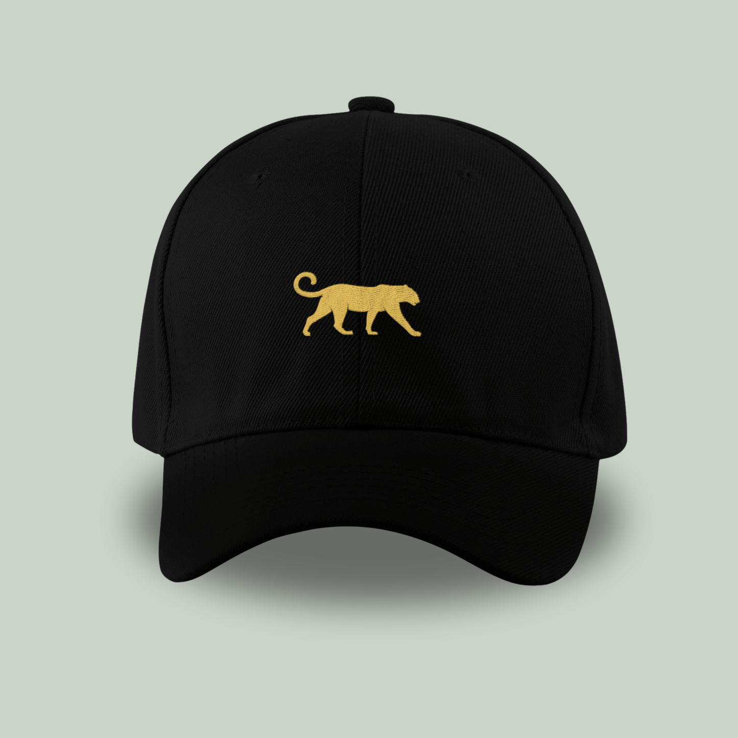 Tucktribe Black cap with a gold panther logo on a light gray background