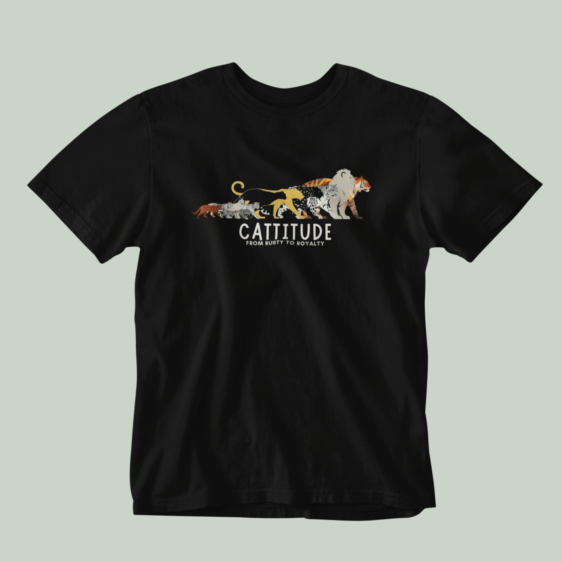 Black Tucktribe t-shirt with cat-themed graphic and 'Cattitude' text on a light green background