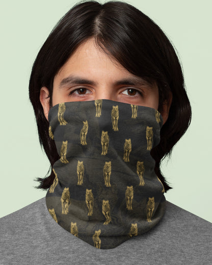 Gold dhole wildlife print on a dark tubular neck gaiter