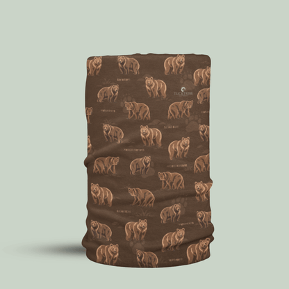 A brown neck gaiter or face mask featuring a repeating pattern of brown bears and small text, shown on a light sage green background.
