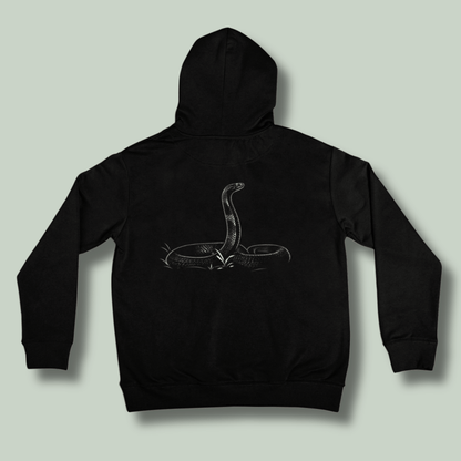 Black tucktribe unisex hoodie featuring  detailed cobra snake artwork on the back for wildlife lovers.
