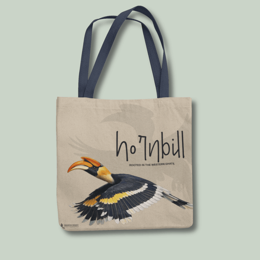 Tucktribe Tote bag with a hornbill design and text on a light green background