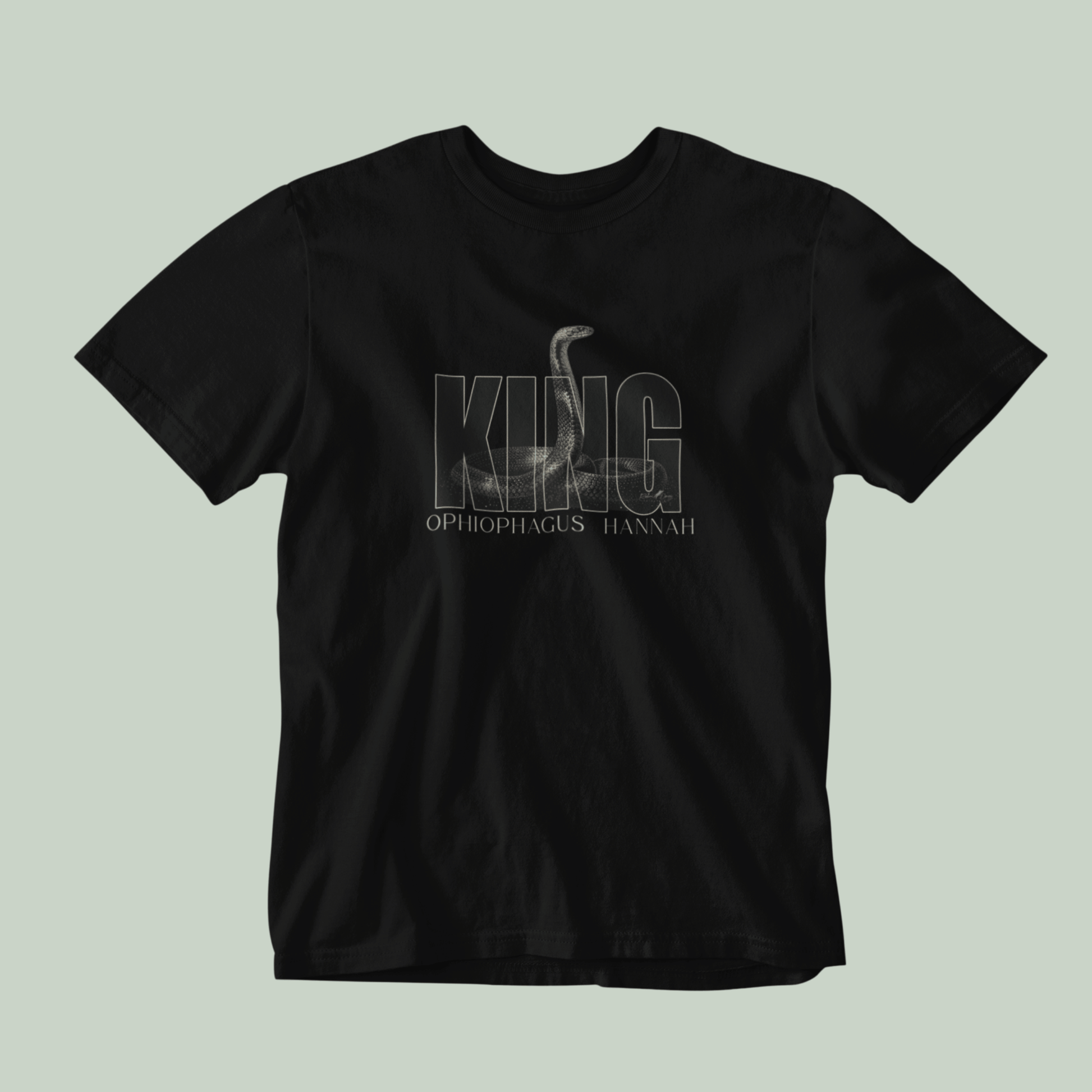 King Cobra wildlife T-shirt featuring detailed Ophiophagus hannah snake artwork with bold KING typography