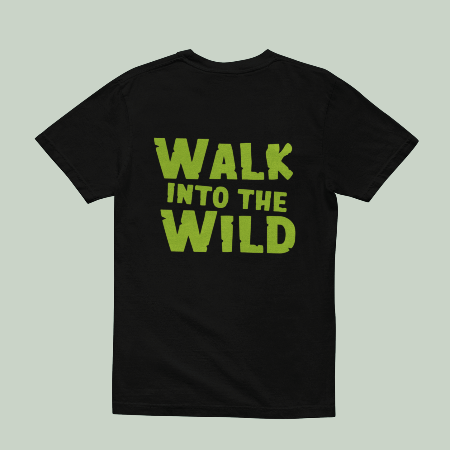 back view of Black t-shirt with 'WALK INTO THE WILD' text in green on a light green background