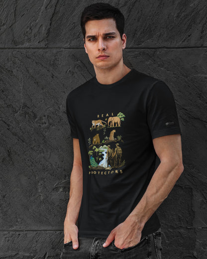 Man wearing a black tucktribe t-shirt with a conservation graphic design against a dark stone wall.
