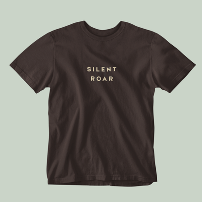 Brown Tucktribe t-shirt with 'SILENT ROAR' text on a light green background