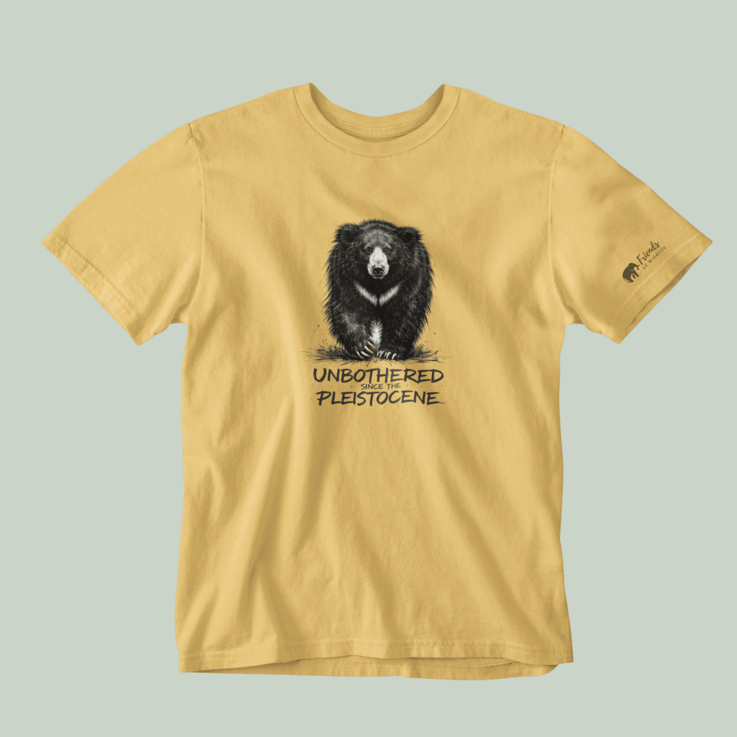 Beige t-shirt with a bear graphic and text on a light gray background