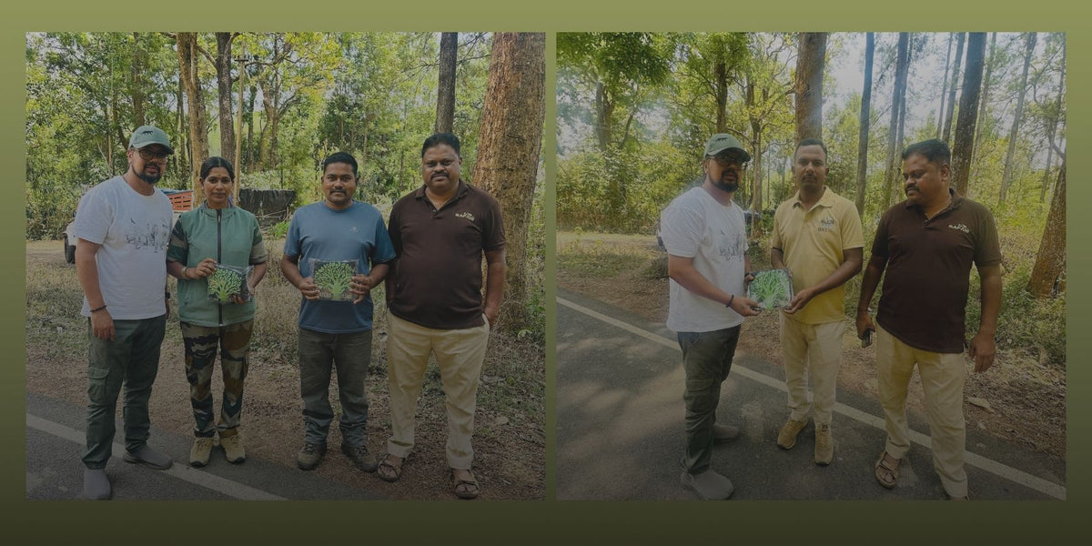 People holding Tucktribe T-shirts distributed to forest communities in India