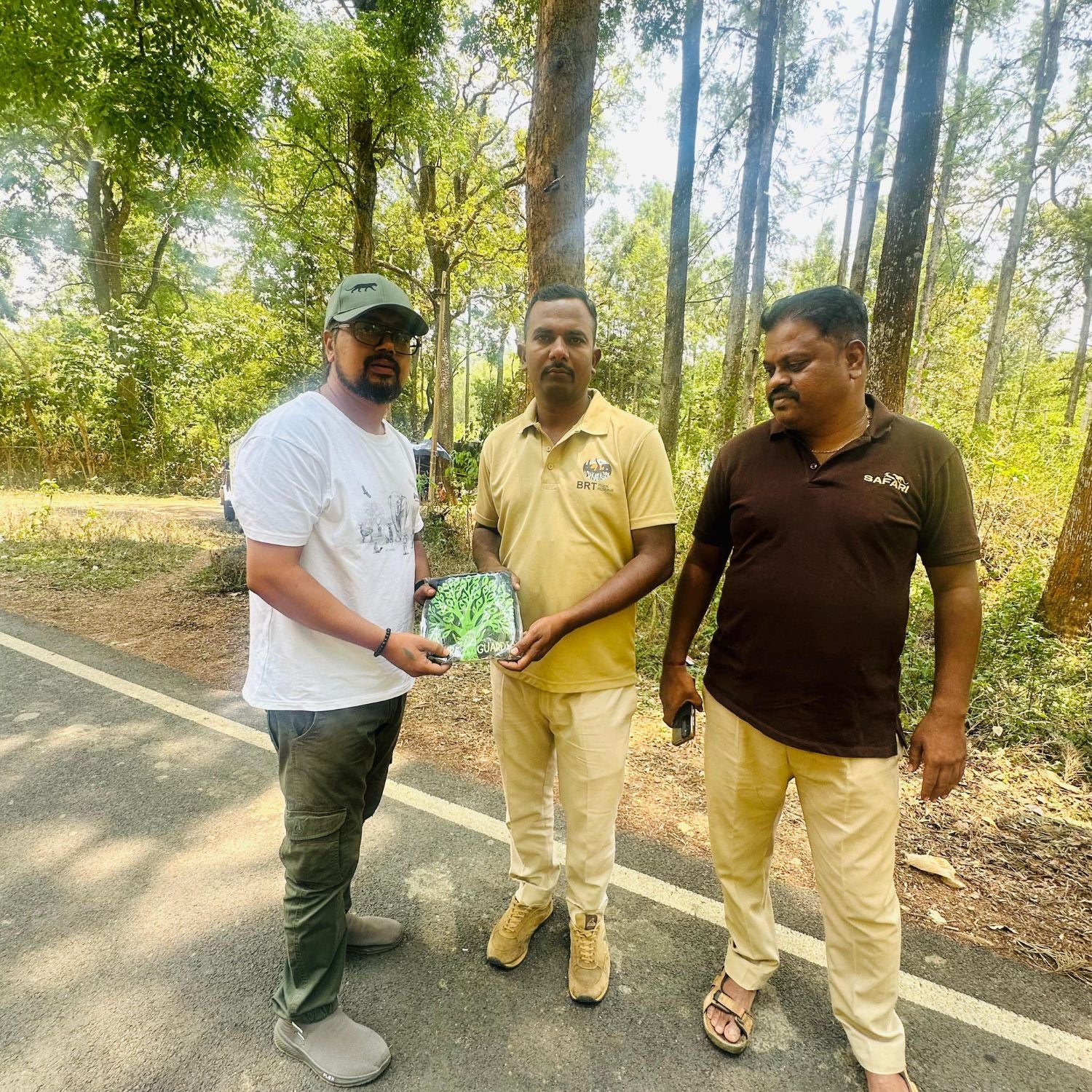 Tucktribe team distributing tshirts for forest guards