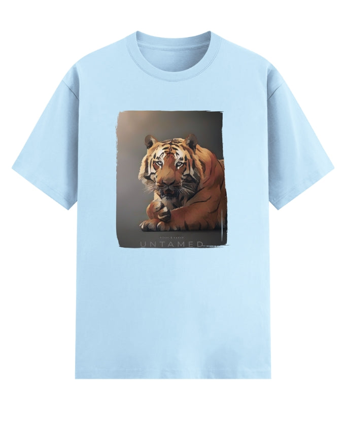 Light blue t-shirt with a tiger graphic and 'UNTAMED' text on a white background
